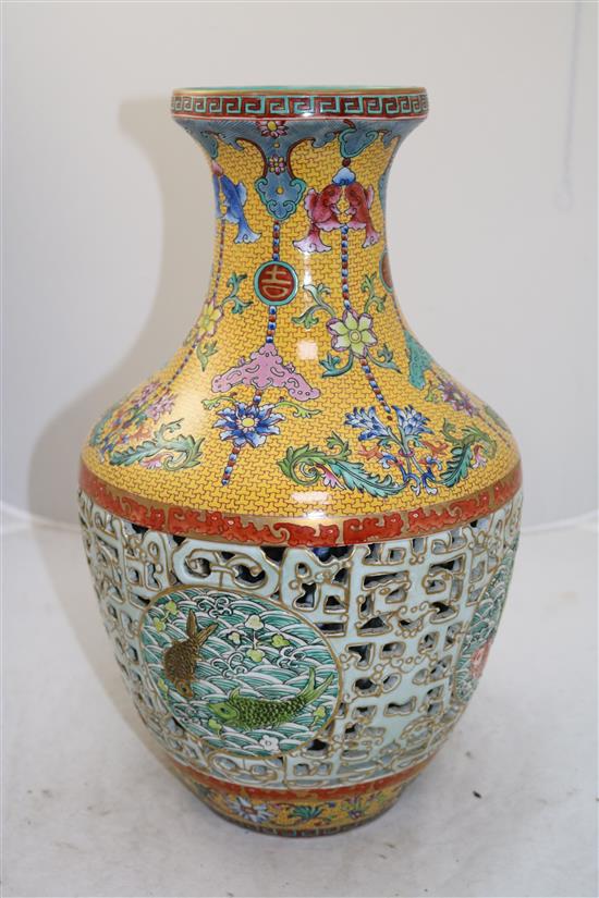 A Chinese yellow ground double-walled reticulated vase, modern, 42cm